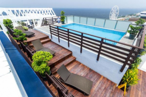 Отель Microtel by Wyndham Mall of Asia - Multiple Use Hotel  Манила